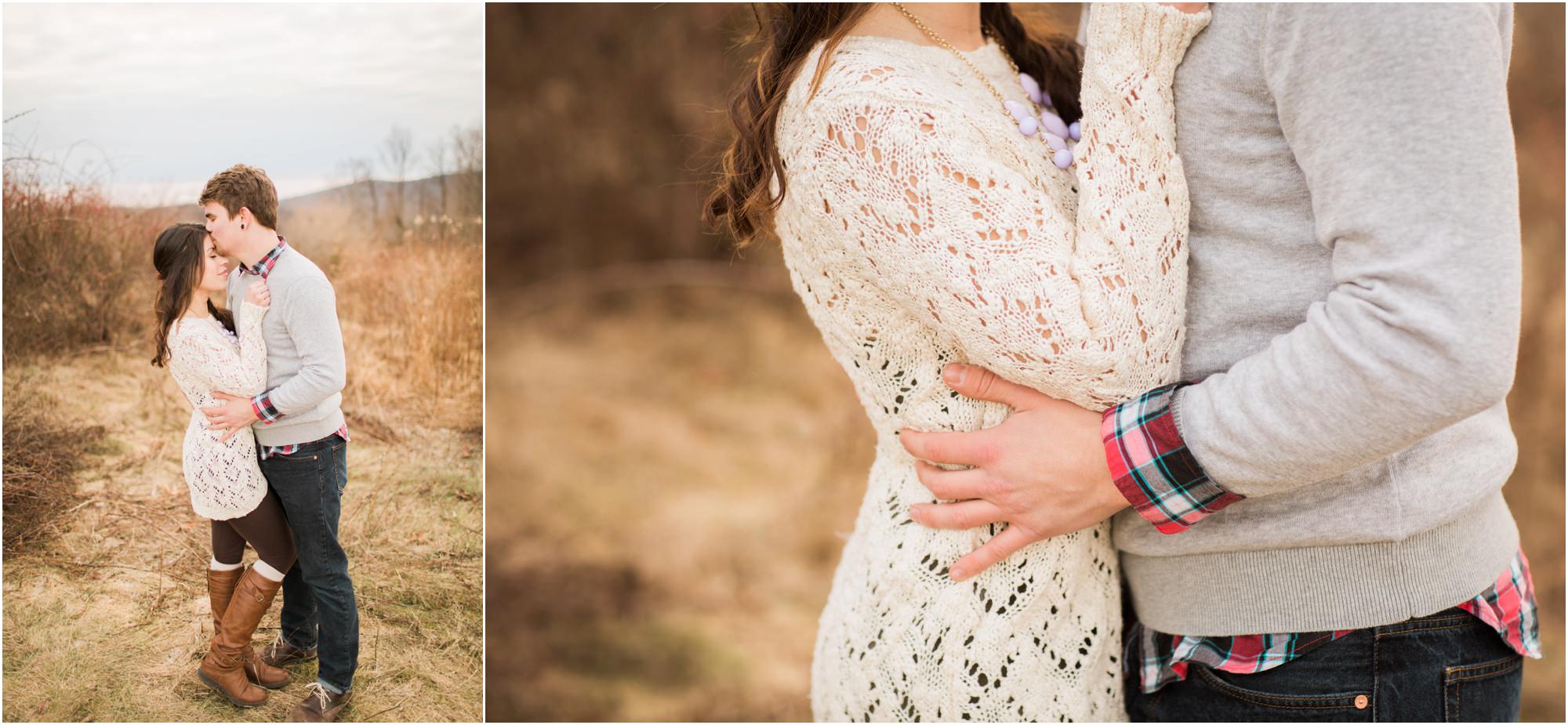 Couple in a field after pillow fight engagement session