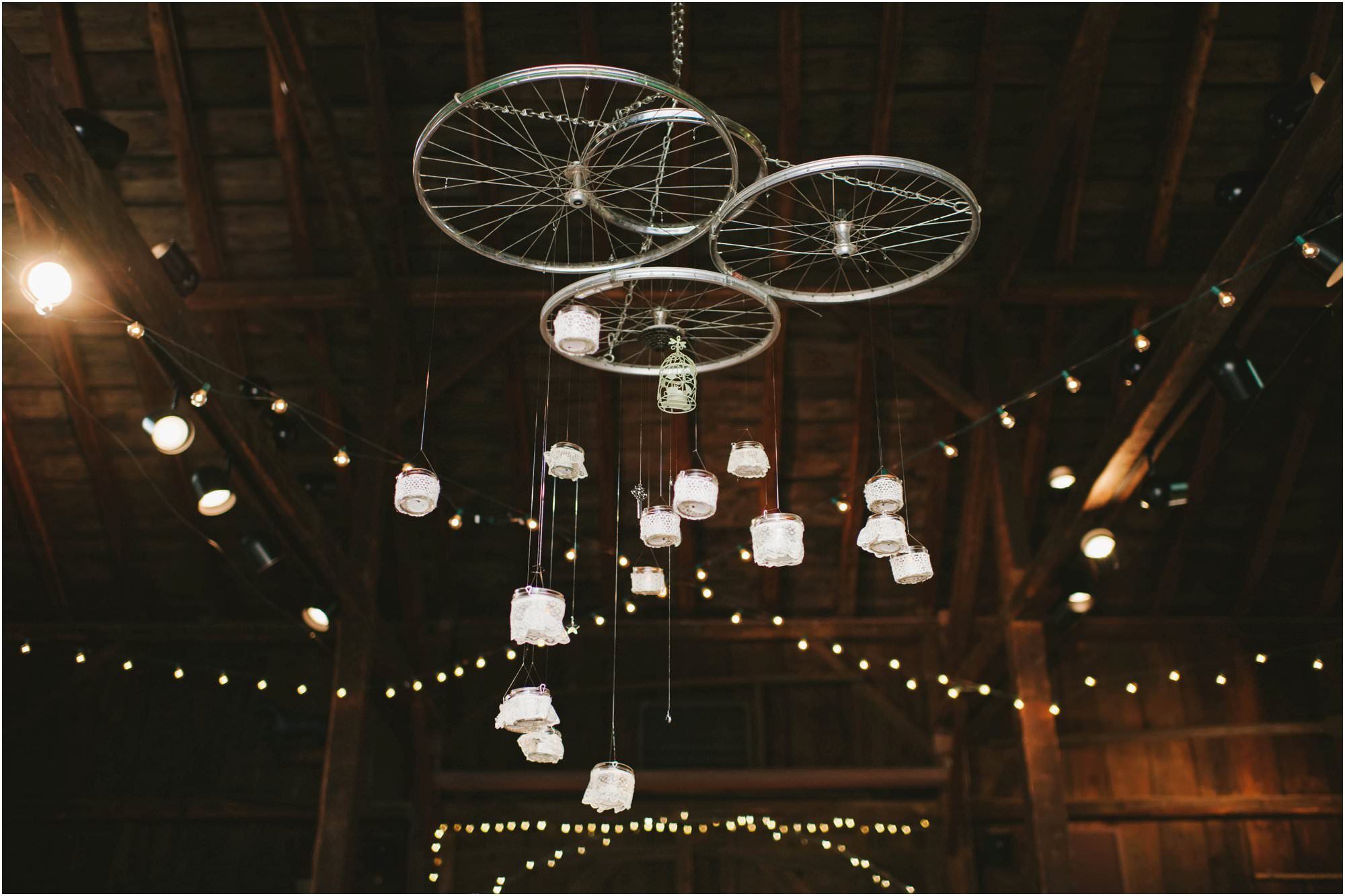 rustic webb barn wedding bicycle chandelier