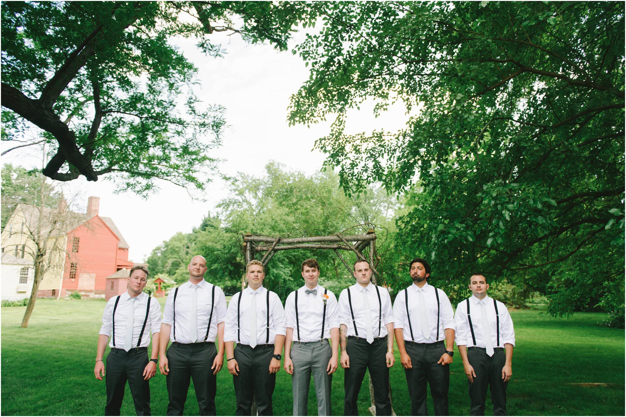 rustic webb barn wedding suspender groomsmen