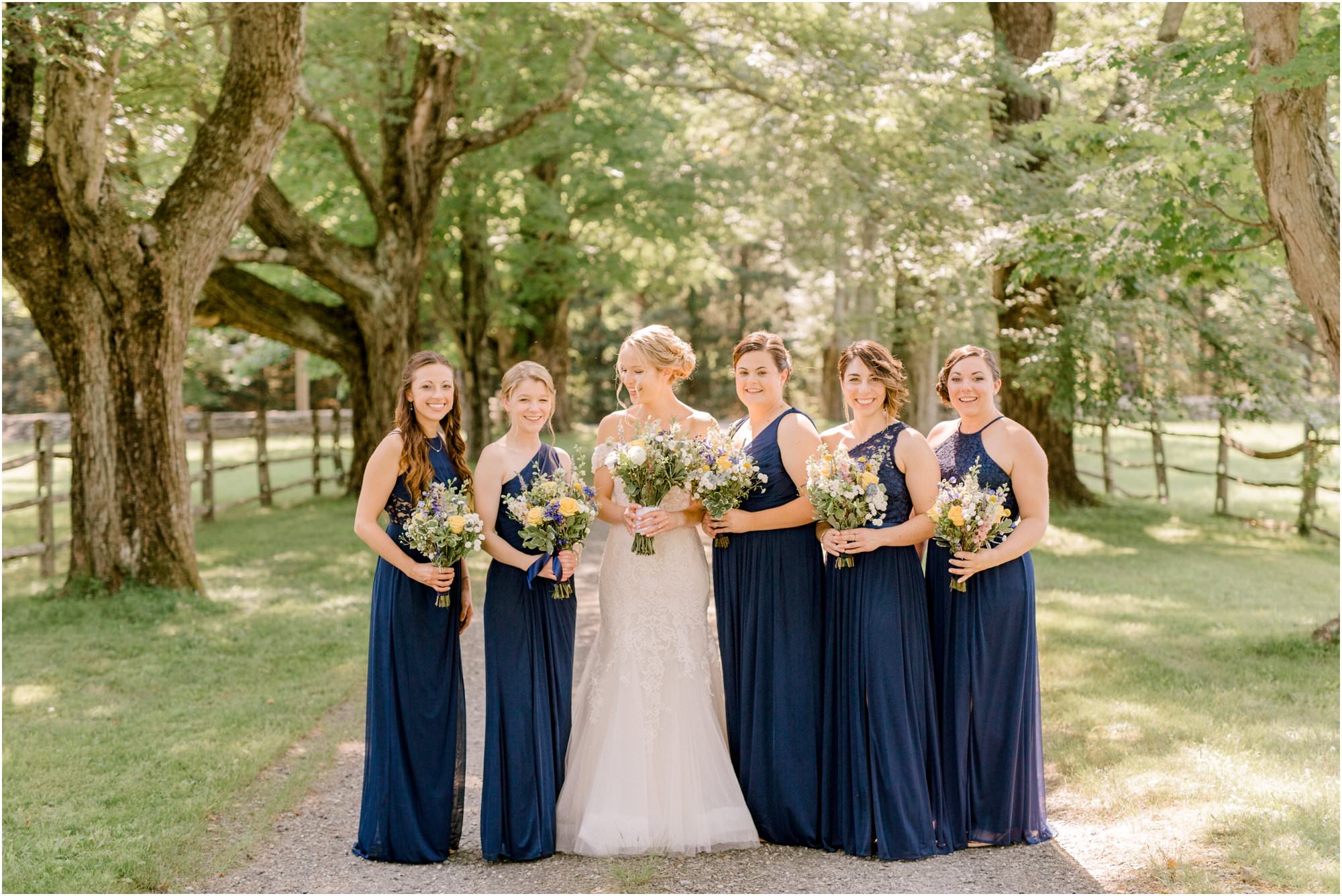 romantic summer tyrone farm wedding navy bridesmaids