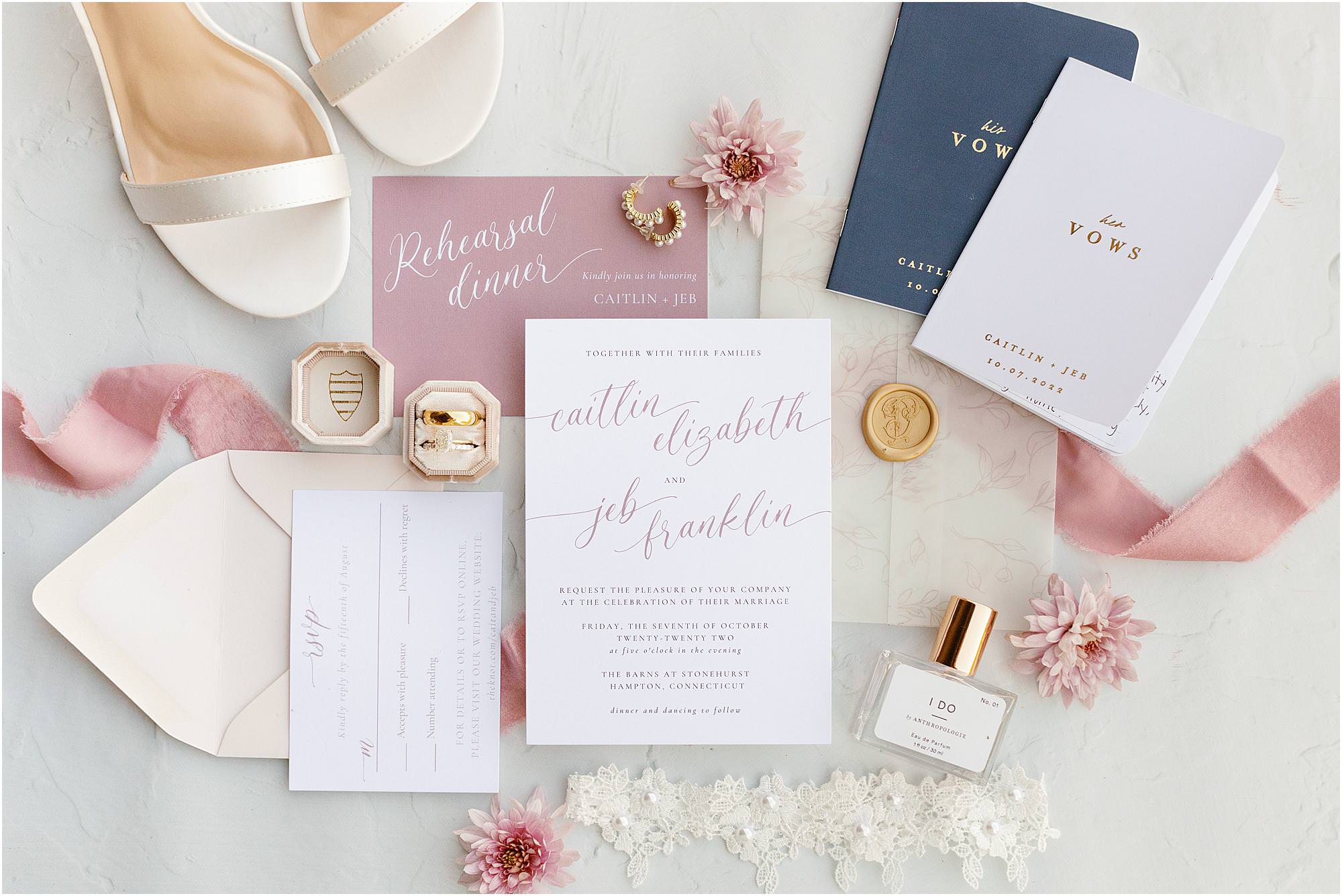 Pink and white flatlay of bridal details at Stonehurst at Hampton Valley wedding in Connecticut 