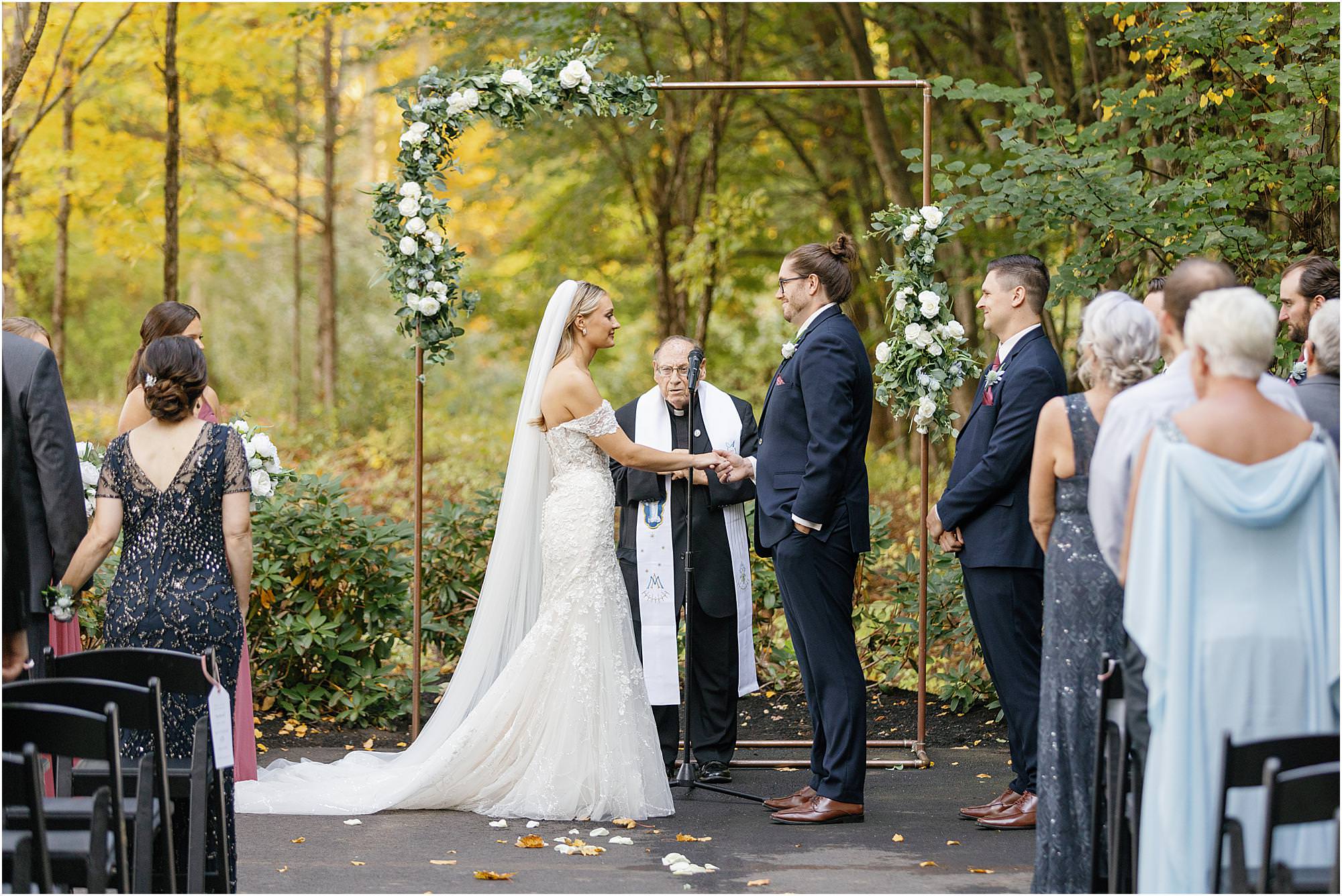fall wedding ceremony at romantic stonehurst at Hampton valley wedding